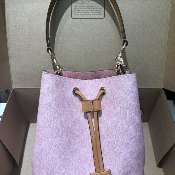 Coach Handbags - Coach Rowan Bucket Bag In Signature Canvas With Charms